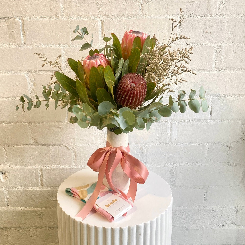 Australian Native florals in small white vase