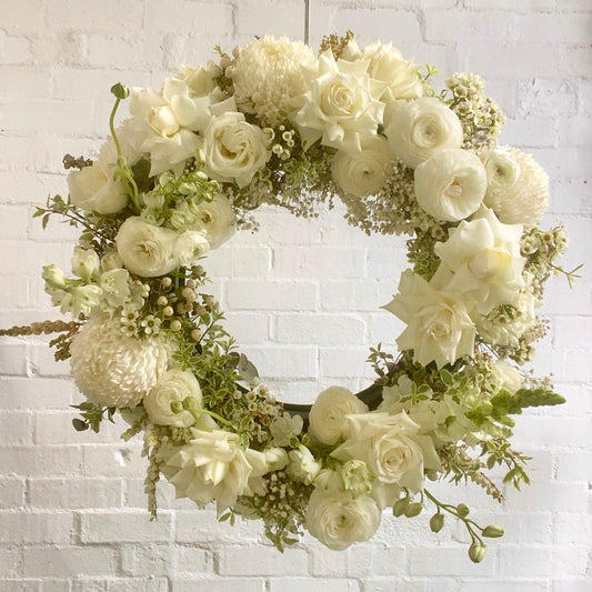 white sympathy wreath