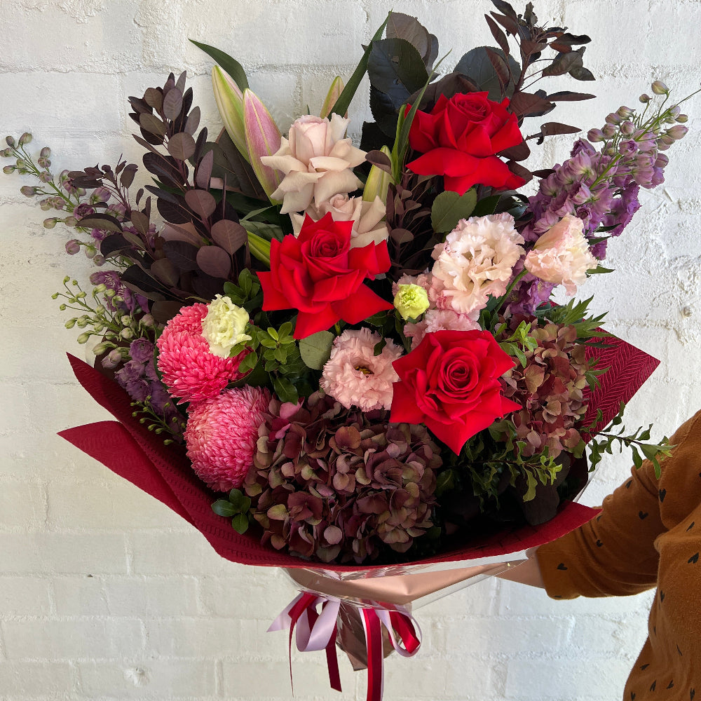 Extra Large Bouquet of red roses pink disbuds and other mixed flowers.