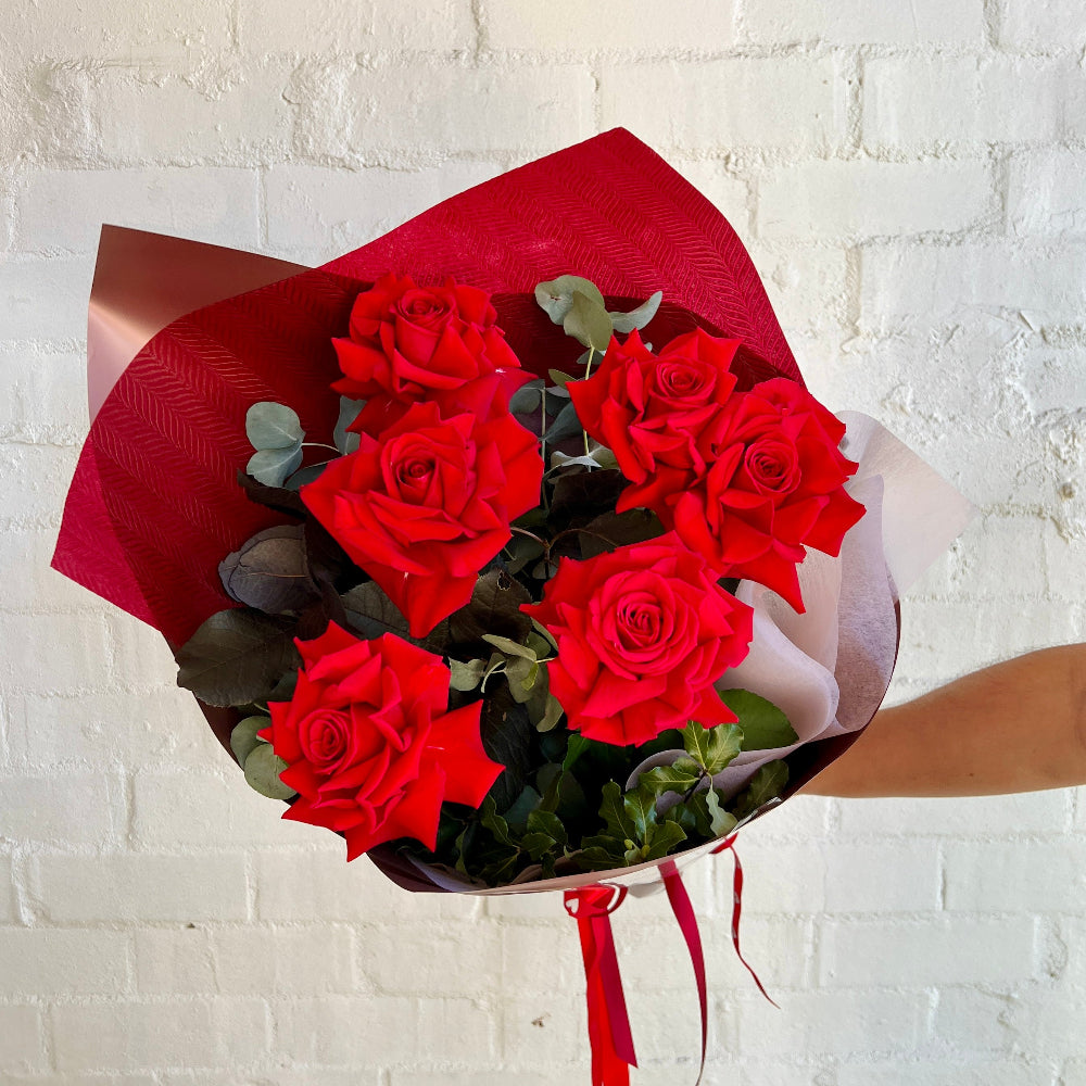 Half a dozen red roses