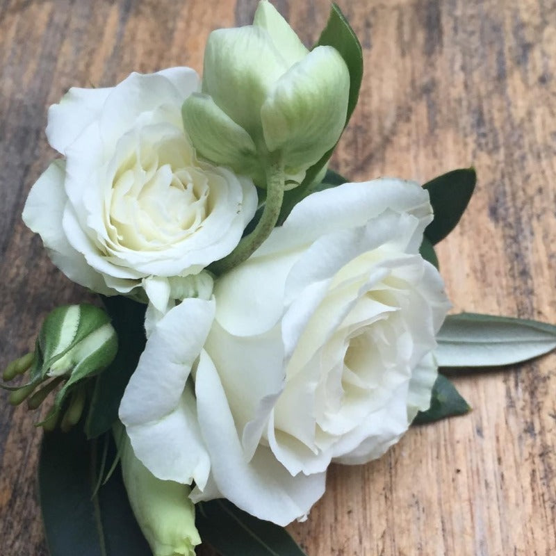 Buttonhole flower arrangement for school formal