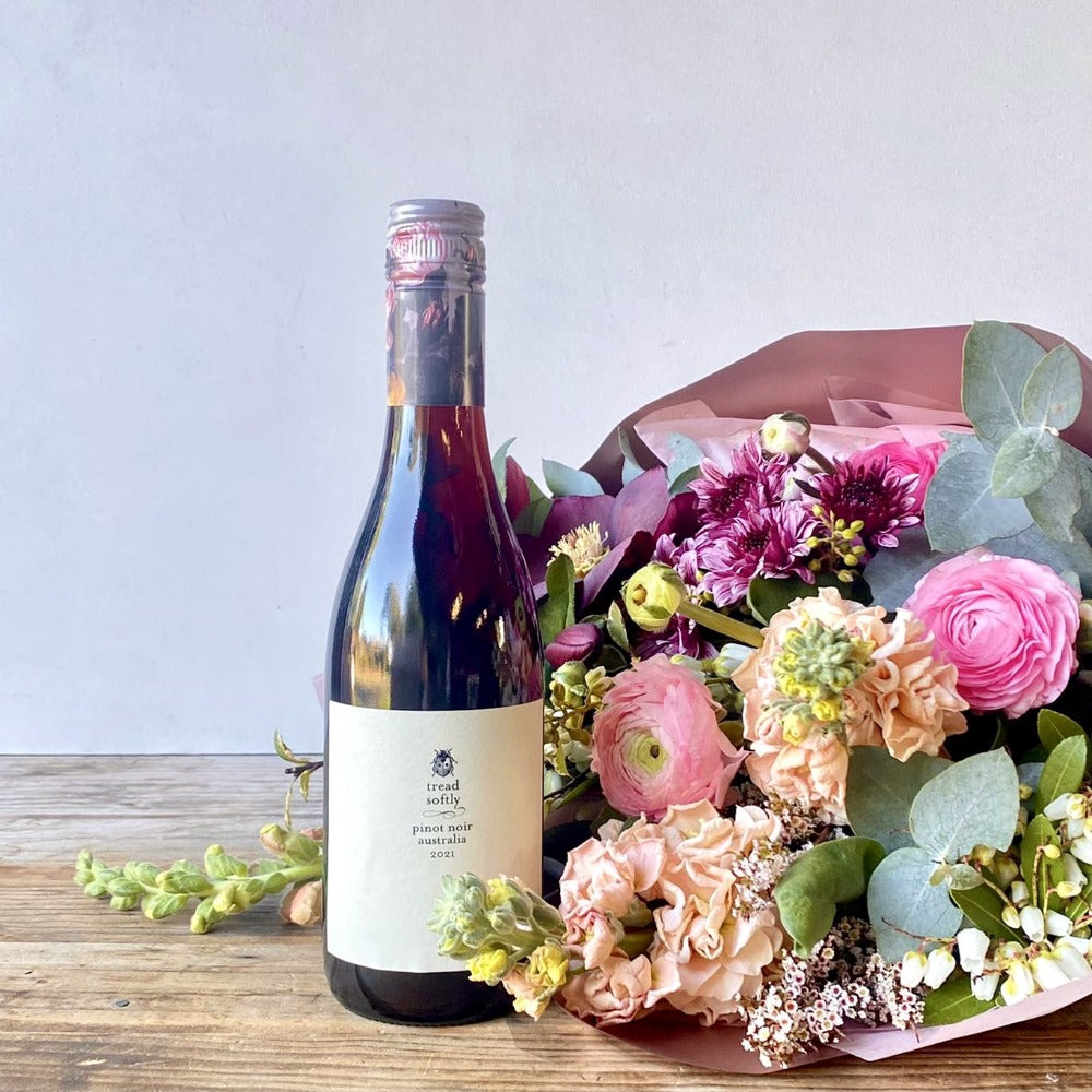 red wine and fresh flowers