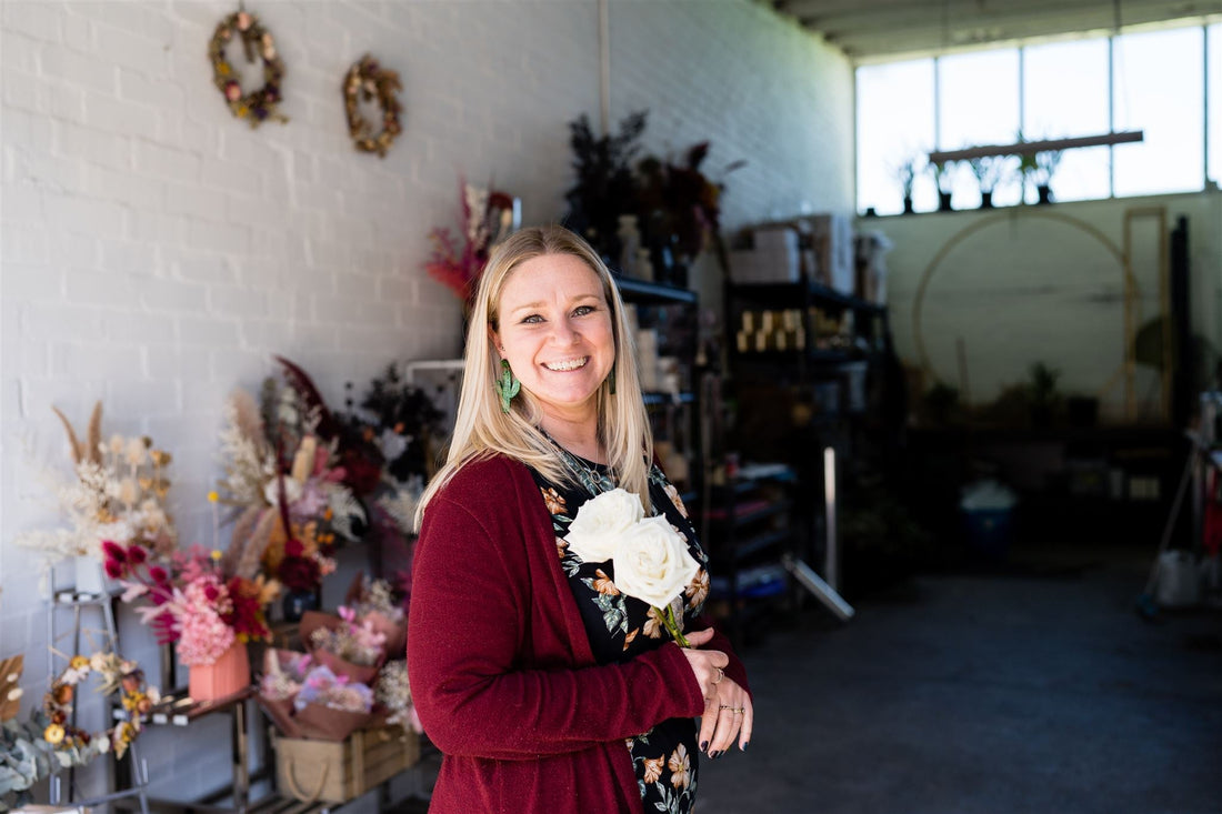 Head florist Nat of Foxy Evergreen Flowers