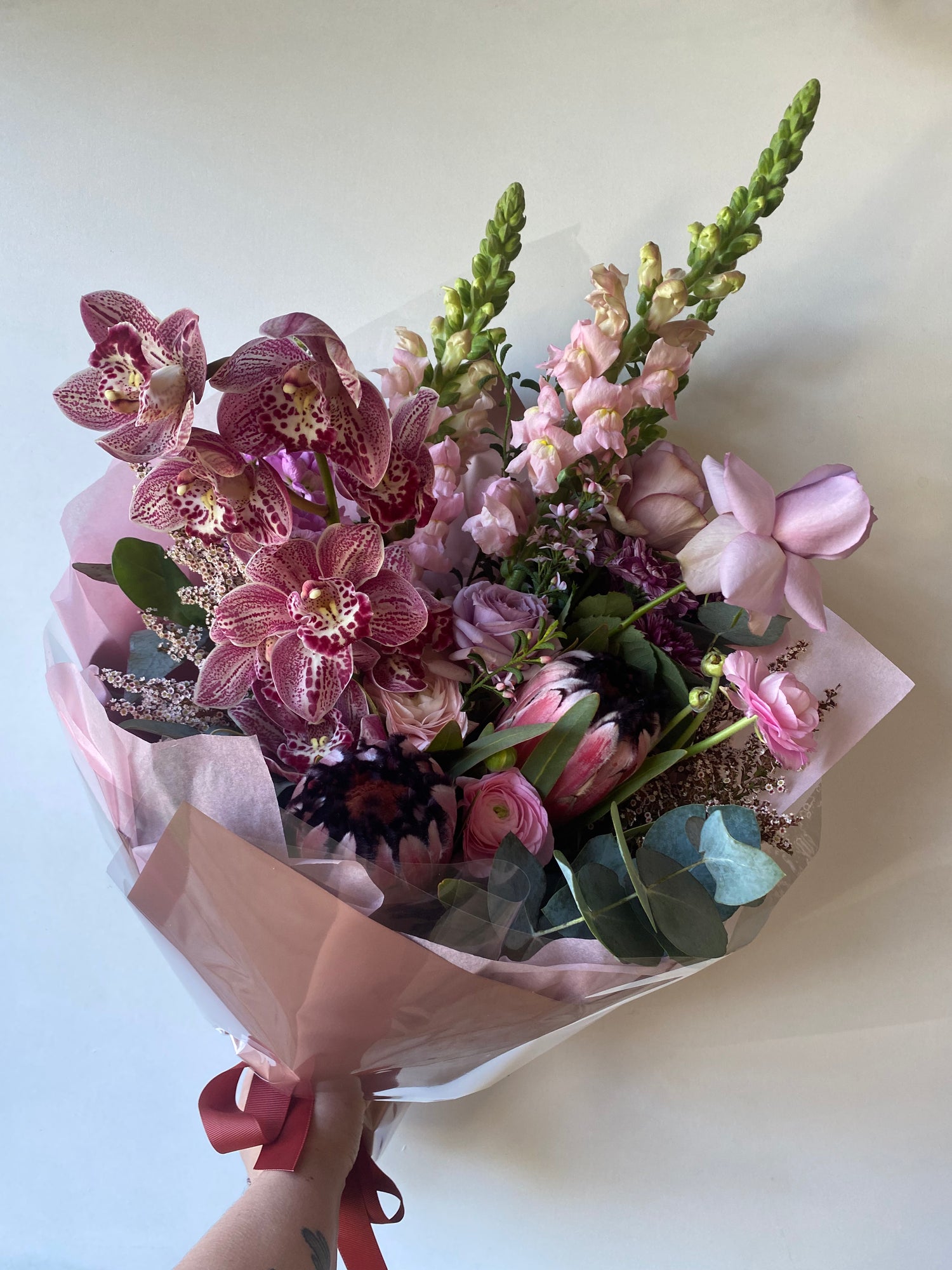 Orchid and seasonal flower bouquet for delivery in melbourne