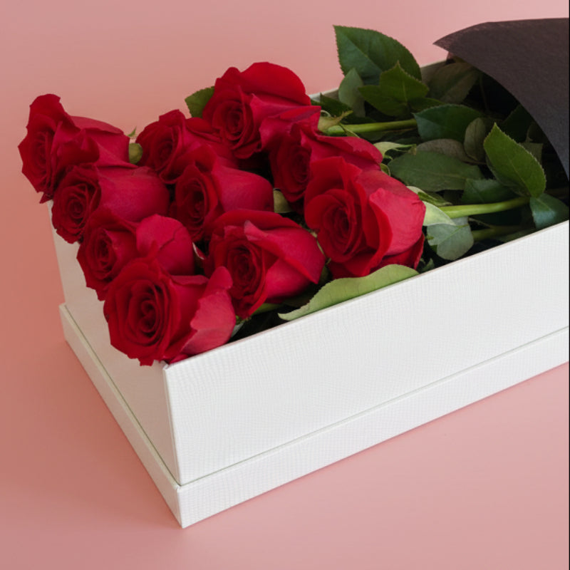 long stem red roses in a premium white gift box