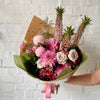 Mixed bouquet of pink roses, dahlias, pineapple lily and hydrangea 