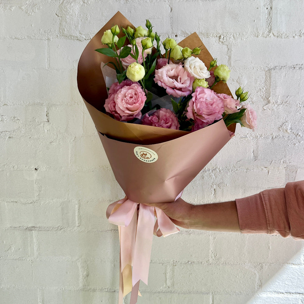 Pink Lisianthus bouquet with pink ribbon