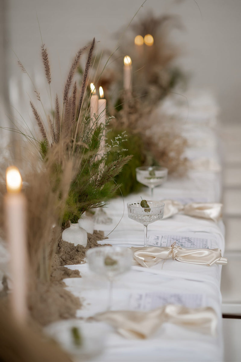 Organic wedding tablescape with pampas grass, candles and native foliage by Foxy Evergreen Melbourne