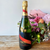 MUMM champagne and flower bouquet