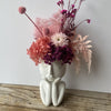 preserved flower arrangement in peaceful thinking vase