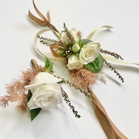 button hole and wrist corsage with fresh flowers